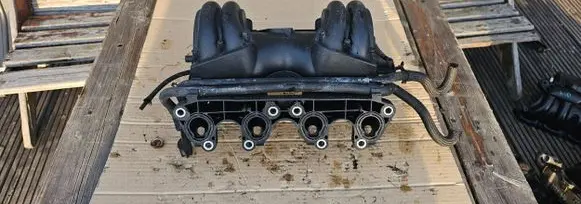 Volkswagen Golf III Intake manifold 030129711AR