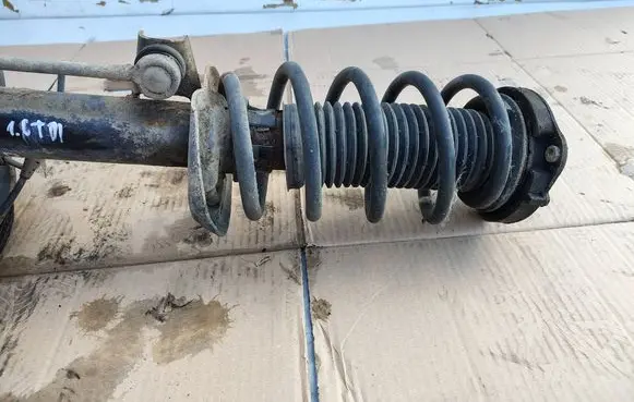 Volkswagen PASSAT B6 Front shock absorber with coil spring