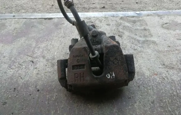 Mazda 3 II Front brake caliper