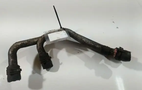 Volkswagen Touareg I Engine coolant pipe/hose