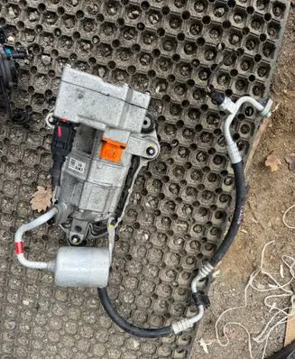 Hyundai Ioniq 5 Air conditioning (A/C) compressor (pump) 977E1CU000 HES45