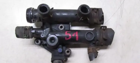 Thermostat/thermostat housing