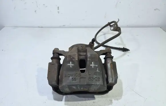 Toyota Prius+ (ZVW40) Front brake caliper ADVICS 4773047060