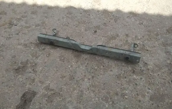 Top upper radiator support slam panel