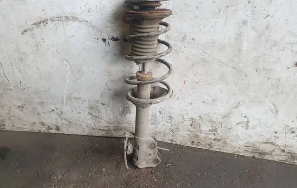 Toyota Yaris Verso Front shock absorber with coil spring