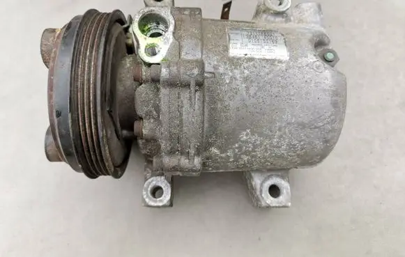 Subaru Impreza II Air conditioning (A/C) compressor (pump) 73111FE021 0106150169