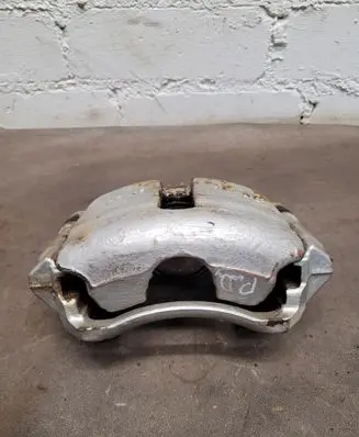 Volkswagen Golf VII Front brake caliper