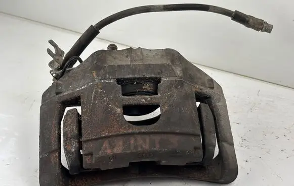Audi A6 S6 C6 4F Front brake caliper 973