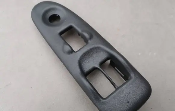 Chevrolet Trans Sport Front door window switch trim 10245148