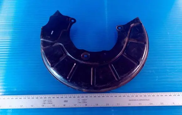 Volkswagen PASSAT B6 Front brake disc dust cover plate 1K0615311F