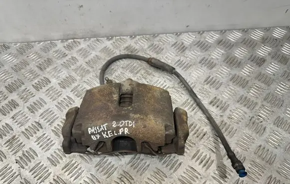 Volkswagen PASSAT B7 Front brake caliper