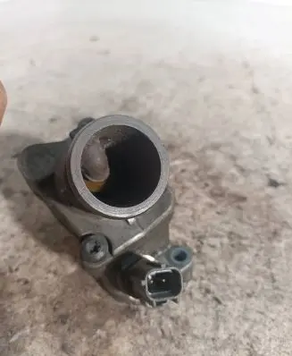 Thermostat/thermostat housing