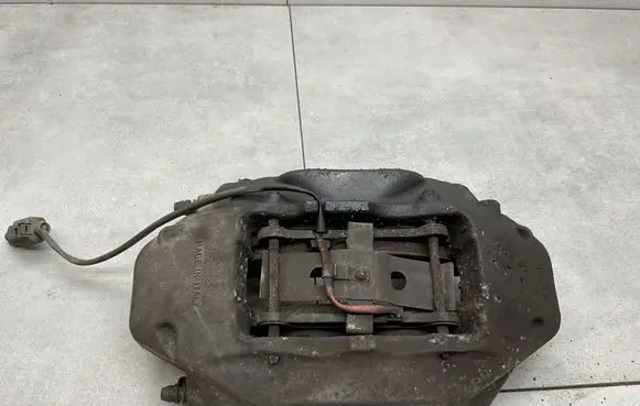 Volkswagen Touareg II Front brake caliper 