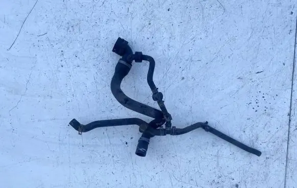 Volkswagen Touareg I Engine coolant pipe/hose 7L6122291