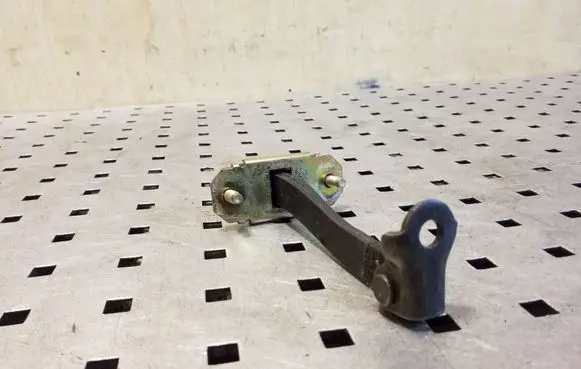 Rear door check strap stopper