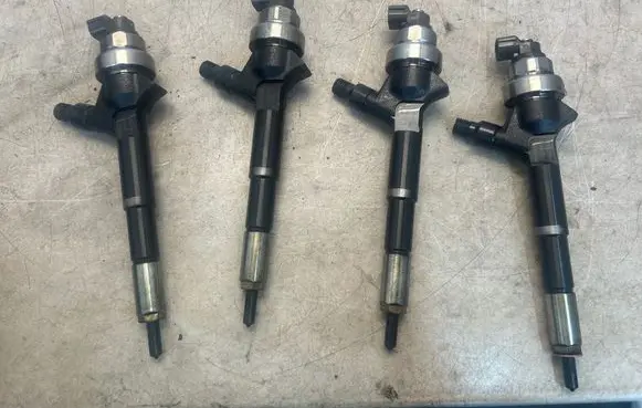 Opel Astra J Fuel injectors set 8973762703