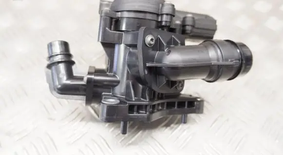 Thermostat/thermostat housing