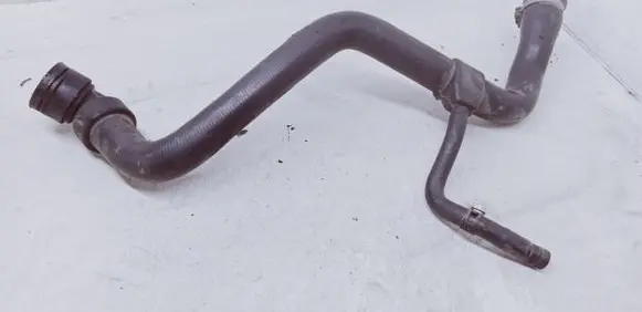 Volkswagen PASSAT B5 Engine coolant pipe/hose