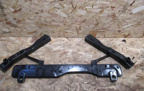 Radiator support slam panel bracket