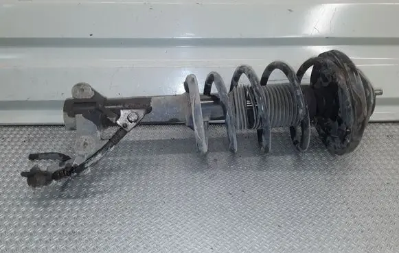 Nissan Primera Front shock absorber with coil spring