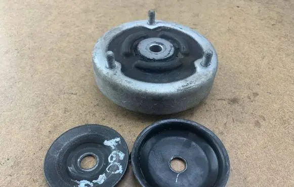 Coil spring mount