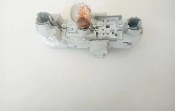 Volvo S40, V40 Tail light bulb cover holder