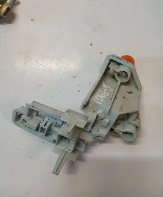 Tail light bulb cover holder