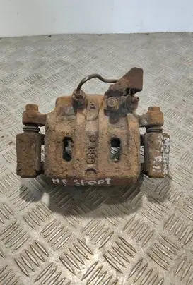 Mitsubishi Pajero Sport I Front brake caliper 