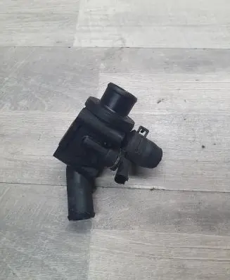 Thermostat/thermostat housing
