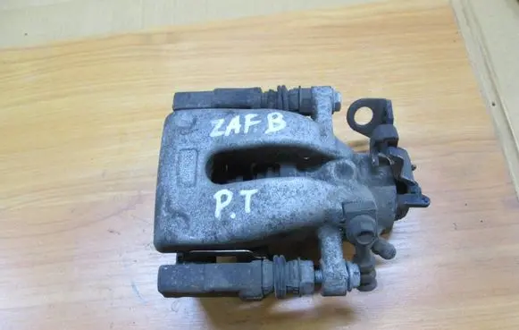 Opel Zafira B Brake caliper pad carrier rear 980404623