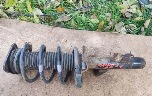 Mazda 3 II Front shock absorber with coil spring BBM234700A 8N6118045AD