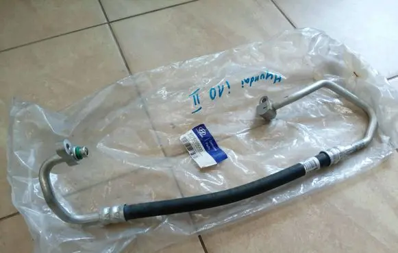 Hyundai i10 Air conditioning (A/C) pipe/hose 97762B9000 NE68398