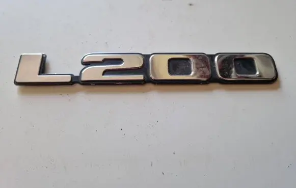 Mitsubishi L200 Front door emblem/model letters 