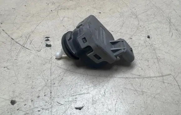 Opel Astra G Headlight level adjustment motor 90590665