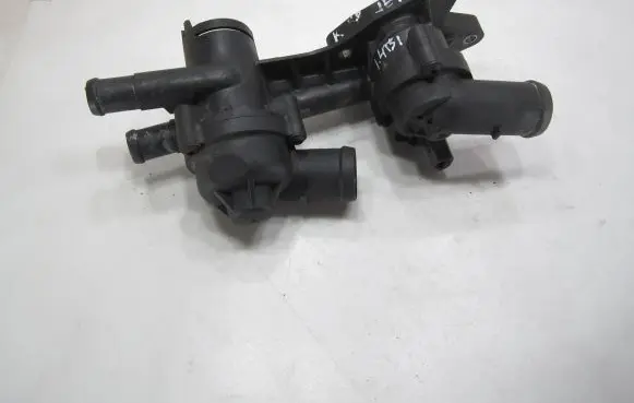 Thermostat/thermostat housing