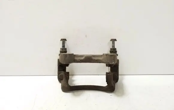 Volkswagen PASSAT B6 Brake caliper pad carrier rear 