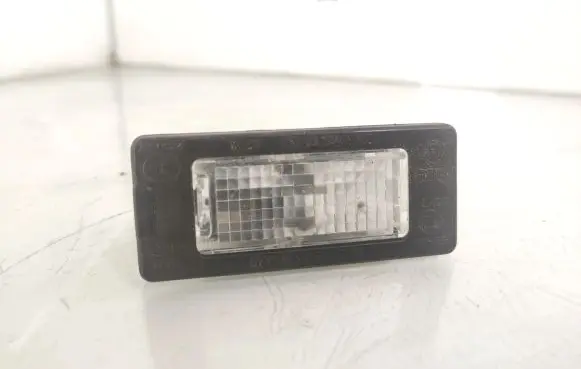 Volkswagen Golf VI Number plate light 5N0943021 1K9943021A