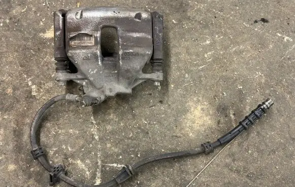 Peugeot 308 Front brake caliper 705009