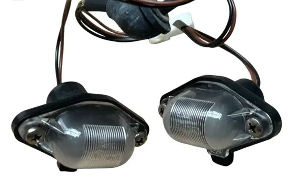 Nissan Micra Number plate light 265101F500
