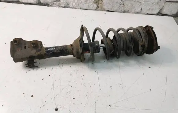 Toyota Yaris Front shock absorber with coil spring