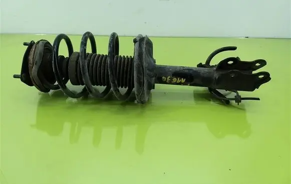 Nissan Almera N16 Front shock absorber with coil spring