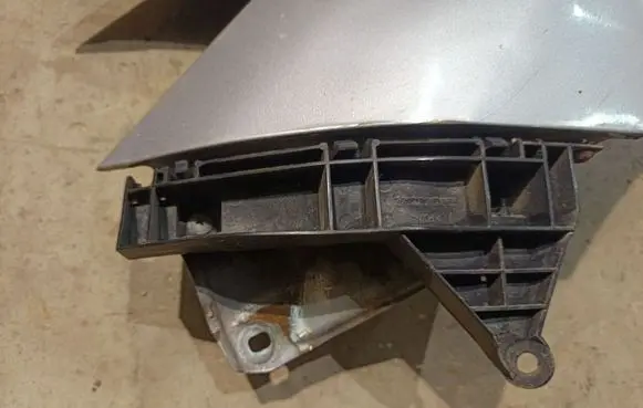 Honda FR-V Front bumper mounting bracket 