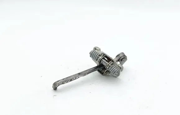 Front door check strap stopper