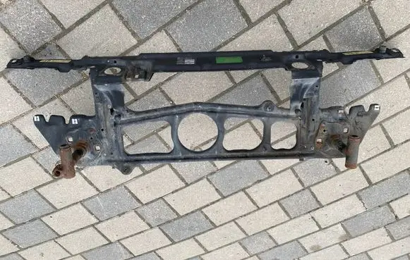 Radiator support slam panel