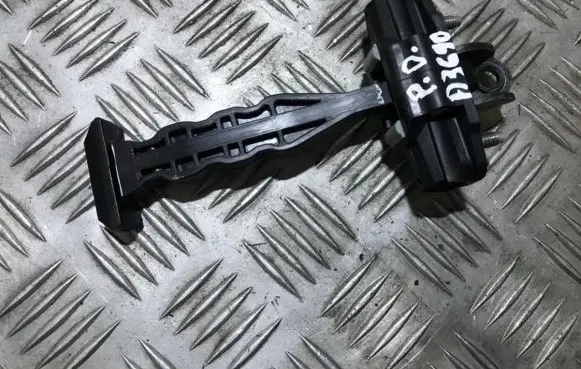 Front door check strap stopper