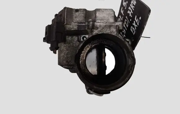 Volkswagen Touran I Throttle valve 03G128063C