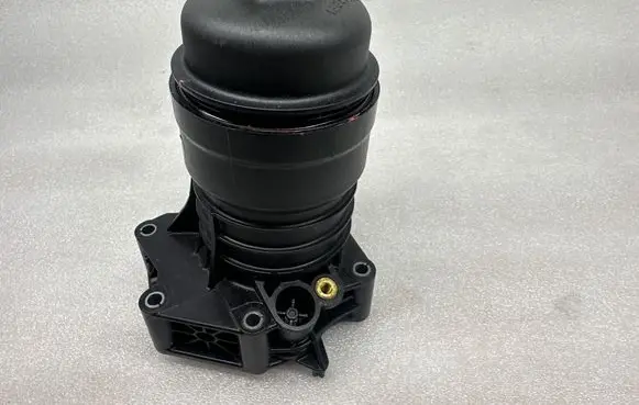 Audi A4 S4 B9 Oil filter mounting bracket 06M115401F