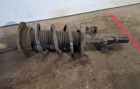 Volvo V60 Front shock absorber with coil spring 31406001