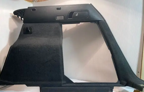 Trunk/boot lower side trim panel
