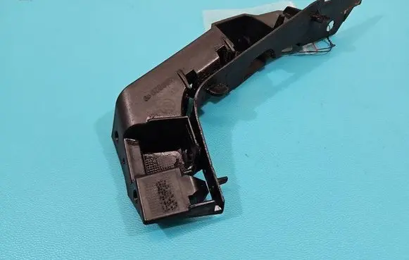 Front bumper mounting bracket